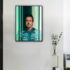 Portrait du pilote Fernando Alonso en tenue Aston Martin avec citation “The Car is Slow, Not Me”