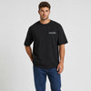T-shirt Alpine A110 noir vu de face en plan rapproché avec logo Tourismo