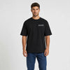 T-shirt F1 Daniel Ricciardo Signature noir vu de face en plan rapproché avec logo Tourismo