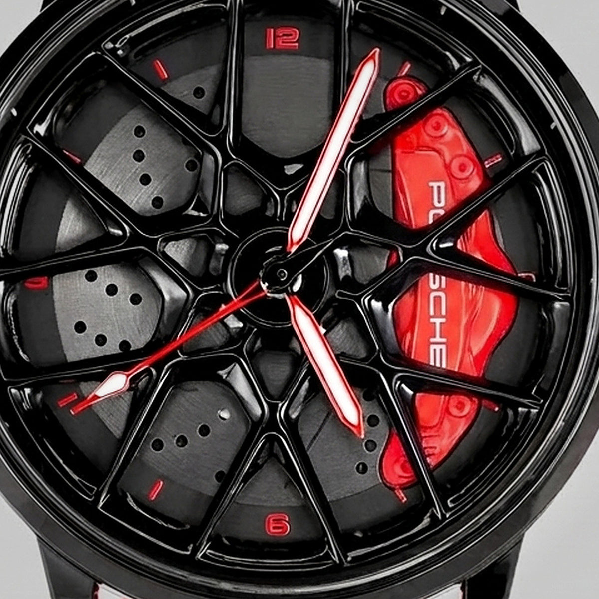 Close-up of the wheel and the PORSCHE engraved caliper, Porsche 718 watch