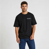 T-shirt F1 Fernando Alonso Signature noir vu de face en plan rapproché avec logo Tourismo