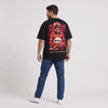 T-shirt F1 Michael Schumacher Signature noir porté de dos en plan large