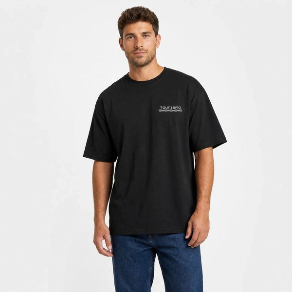 T-shirt Toyota Land Cruiser Fj40 Built Beyond Roads noir vu de face en plan rapproché avec logo Tourismo